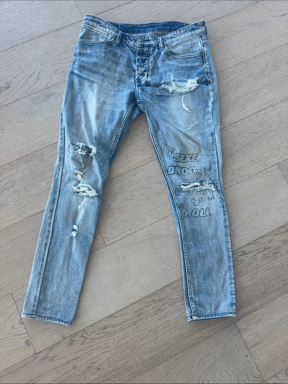 Ksubi Light Blue Distressed Skinny Jeans with Graphic Print